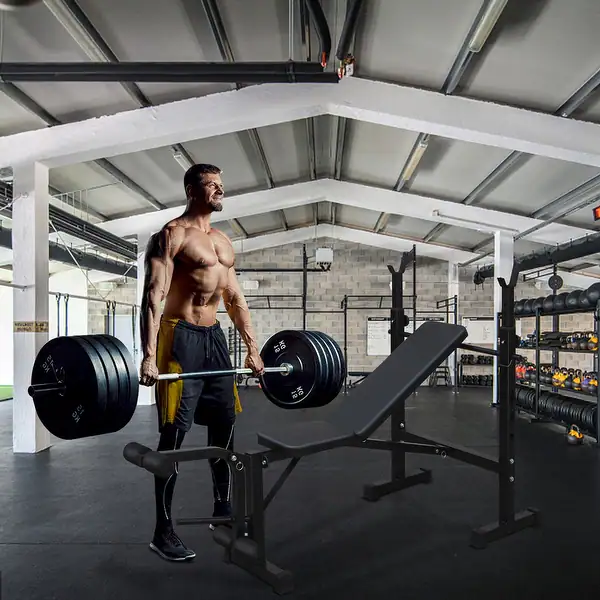 Text: olympic barbell garage gym workout