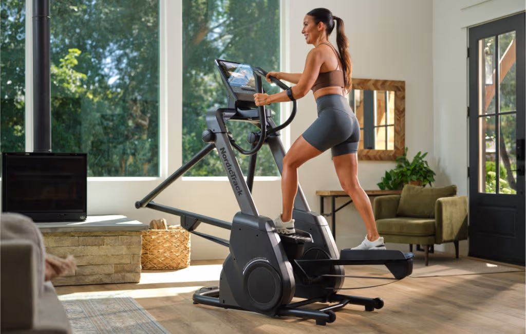 person doing cardio and strength training workout at home gym