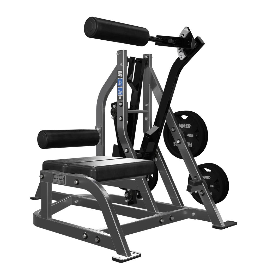 Assisted Nordic curl machine in a home gym setup