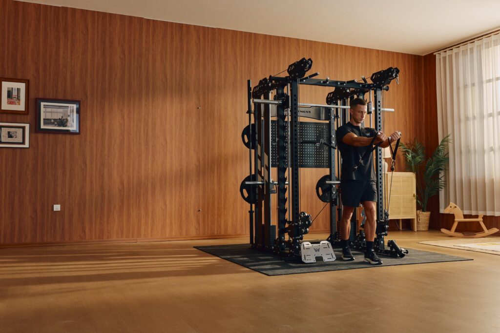 Athlete using a functional trainer in a stylish home gym during a cable workout