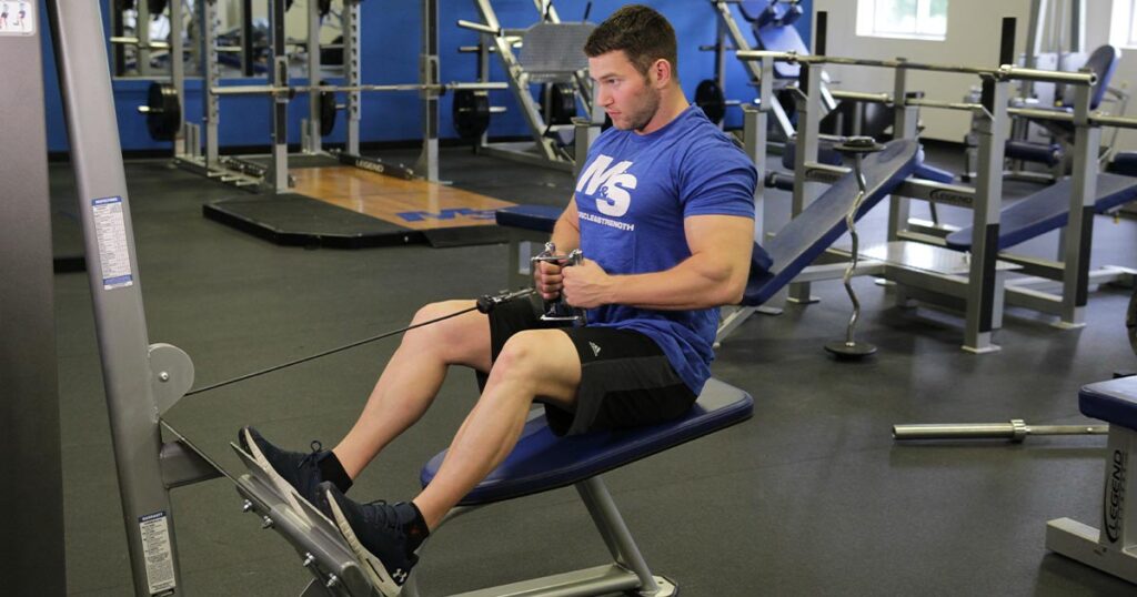 Close grip cable row and lat pulldown exercises using cable machine attachments